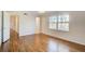 Spacious bedroom with hardwood floors and neutral walls at 882 Edgewater Trl, Atlanta, GA 30328