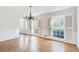 Spacious dining room featuring hardwood floors and a chandelier at 882 Edgewater Trl, Atlanta, GA 30328