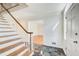 Elegant wooden staircase in a spacious entryway at 882 Edgewater Trl, Atlanta, GA 30328