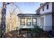 Bright sunroom addition with glass windows and deck access at 882 Edgewater Trl, Atlanta, GA 30328