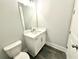 Modern bathroom with white vanity and gray flooring at 1031 Robert Smalls Way, Atlanta, GA 30318