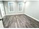 Spacious bedroom with wood-look floors and large windows at 1031 Robert Smalls Way, Atlanta, GA 30318