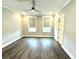 Bright bedroom featuring hardwood floors and ceiling fan at 1031 Robert Smalls Way, Atlanta, GA 30318