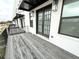 Private deck with wood flooring and brick exterior at 1031 Robert Smalls Way, Atlanta, GA 30318