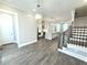 Open entryway with hardwood floors and view into the living area at 1031 Robert Smalls Way, Atlanta, GA 30318