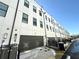 Modern building exterior with attached garages and AC units at 1031 Robert Smalls Way, Atlanta, GA 30318