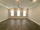 Spacious living room with hardwood floors and ceiling fan at 1031 Robert Smalls Way, Atlanta, GA 30318