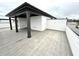 Modern rooftop deck with covered patio and storage area at 1031 Robert Smalls Way, Atlanta, GA 30318