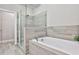 Relaxing bathroom with a soaking tub and separate shower at 2071 Glenview Park Cir, Duluth, GA 30097