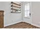 Entryway with wood-look floors and industrial-style shelving at 2071 Glenview Park Cir, Duluth, GA 30097