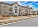 Row of townhomes showcasing brick exteriors and neat landscaping at 2071 Glenview Park Cir, Duluth, GA 30097