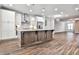 Modern kitchen with two-toned cabinetry, granite island, and stainless steel appliances at 2071 Glenview Park Cir, Duluth, GA 30097