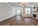 Bright living room features hardwood floors and a stone fireplace at 2071 Glenview Park Cir, Duluth, GA 30097