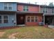 View of the backyard, patio, and the back of the townhome at 4116 Mars Bay # 27, Acworth, GA 30101