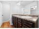 Double vanity bathroom with dark wood cabinets at 4116 Mars Bay # 27, Acworth, GA 30101