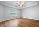 Spacious bedroom with hardwood floors and ceiling fan at 4116 Mars Bay # 27, Acworth, GA 30101