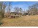 House exterior, showcasing the front yard and landscaping at 900 Sage Nw Ln, Conyers, GA 30012