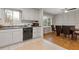 Bright kitchen features ample cabinetry, modern appliances, and a breakfast nook at 900 Sage Nw Ln, Conyers, GA 30012