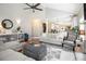 Bright living room features a fireplace, high ceilings and flows into a modern kitchen at 102 Prestwick S Way, Stockbridge, GA 30281