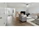 Comfortable living room featuring hardwood floors and neutral decor at 245 Fern Crest Dr, Lawrenceville, GA 30046