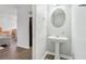 Pedestal sink in powder room on main floor at 245 Fern Crest Dr, Lawrenceville, GA 30046