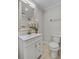 Clean bathroom with single vanity, toilet, and updated features at 40 Rhodes Dr, Marietta, GA 30068