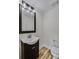 Clean bathroom with updated vanity and flooring at 40 Rhodes Dr, Marietta, GA 30068