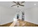 Bedroom with hardwood floors, ceiling fan and access to bathroom at 40 Rhodes Dr, Marietta, GA 30068