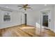 Bedroom with hardwood floors, ceiling fan and backyard access at 40 Rhodes Dr, Marietta, GA 30068