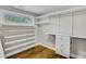 Large walk-in closet with ample shelving and drawer space at 40 Rhodes Dr, Marietta, GA 30068