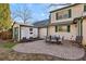 Brick patio with seating area, and detached shed at 5352 Waterford Dr, Dunwoody, GA 30338