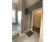 Bathroom with soaking tub, shower, and walk-in closet at 608 Morgans Trce, Ellenwood, GA 30294