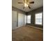 Bright bedroom featuring double closets and carpet at 608 Morgans Trce, Ellenwood, GA 30294