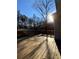 Wooden deck overlooking wooded backyard at 608 Morgans Trce, Ellenwood, GA 30294