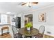 Charming dining area with a round table and four chairs at 763 Windy Sw Dr, Stone Mountain, GA 30087