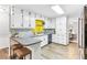 Updated kitchen featuring white cabinets and a gray countertop at 763 Windy Sw Dr, Stone Mountain, GA 30087