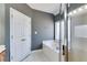 Bathroom featuring a separate glass-enclosed shower and soaking tub, with tile flooring at 9415 Grande Dr, Winston, GA 30187