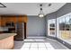 Bright kitchen nook boasts a view and tile floor at 9415 Grande Dr, Winston, GA 30187