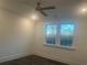 Bright bedroom with ceiling fan and wood floors at 1586 Gunnin Nw Trce # 249, Atlanta, GA 30318