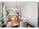 Elegant dining room featuring a large wooden table, chandelier, and natural light at 1918 Saxon Valley Ne Cir, Brookhaven, GA 30319