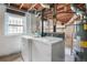 Unfinished basement with washer, dryer, and water heater at 2907 Renfro Nw Dr, Atlanta, GA 30318
