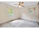 Bright bedroom with ceiling fan and neutral carpeting at 2907 Renfro Nw Dr, Atlanta, GA 30318
