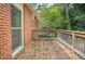 Wooden deck overlooks wooded backyard at 2907 Renfro Nw Dr, Atlanta, GA 30318