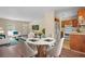 Open concept dining area with hardwood floors and kitchen access at 2907 Renfro Drive Nw Dr, Atlanta, GA 30318