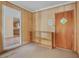 Simple entryway with wood paneling and built-in shelving at 2907 Renfro Nw Dr, Atlanta, GA 30318
