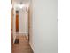 Simple hallway with hardwood floors and neutral walls at 2907 Renfro Nw Dr, Atlanta, GA 30318
