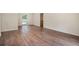 Spacious living room with hardwood floors and access to a deck at 2907 Renfro Nw Dr, Atlanta, GA 30318