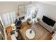 Living area view from above, featuring a fireplace at 12265 Magnolia Crescent Dr, Roswell, GA 30075