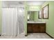 Bathroom with marble shower, vanity, and linen closet at 2768 Hawk Trace Ne Ct, Marietta, GA 30066