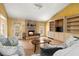 Living room with stone fireplace and built-in shelving at 2768 Hawk Trace Ne Ct, Marietta, GA 30066